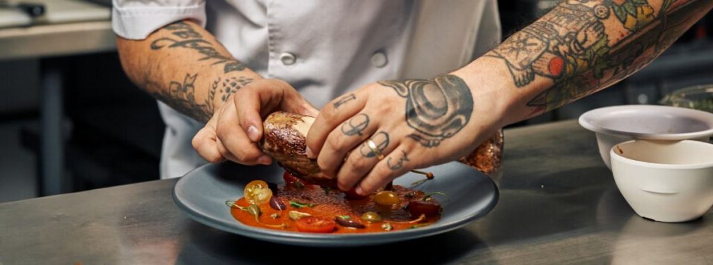 A dish receives its final touch