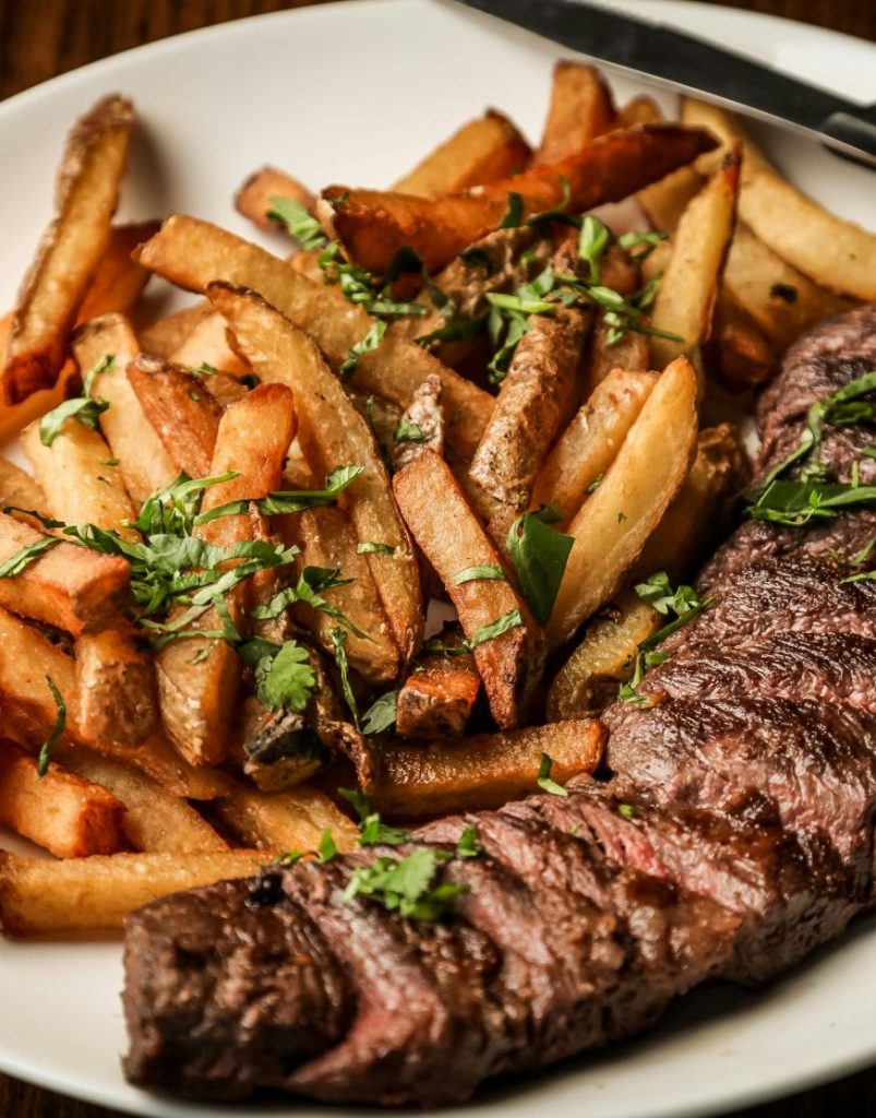 Steak frites with green peppercorn sauce